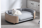 White cat in original wooden sofa pet bed